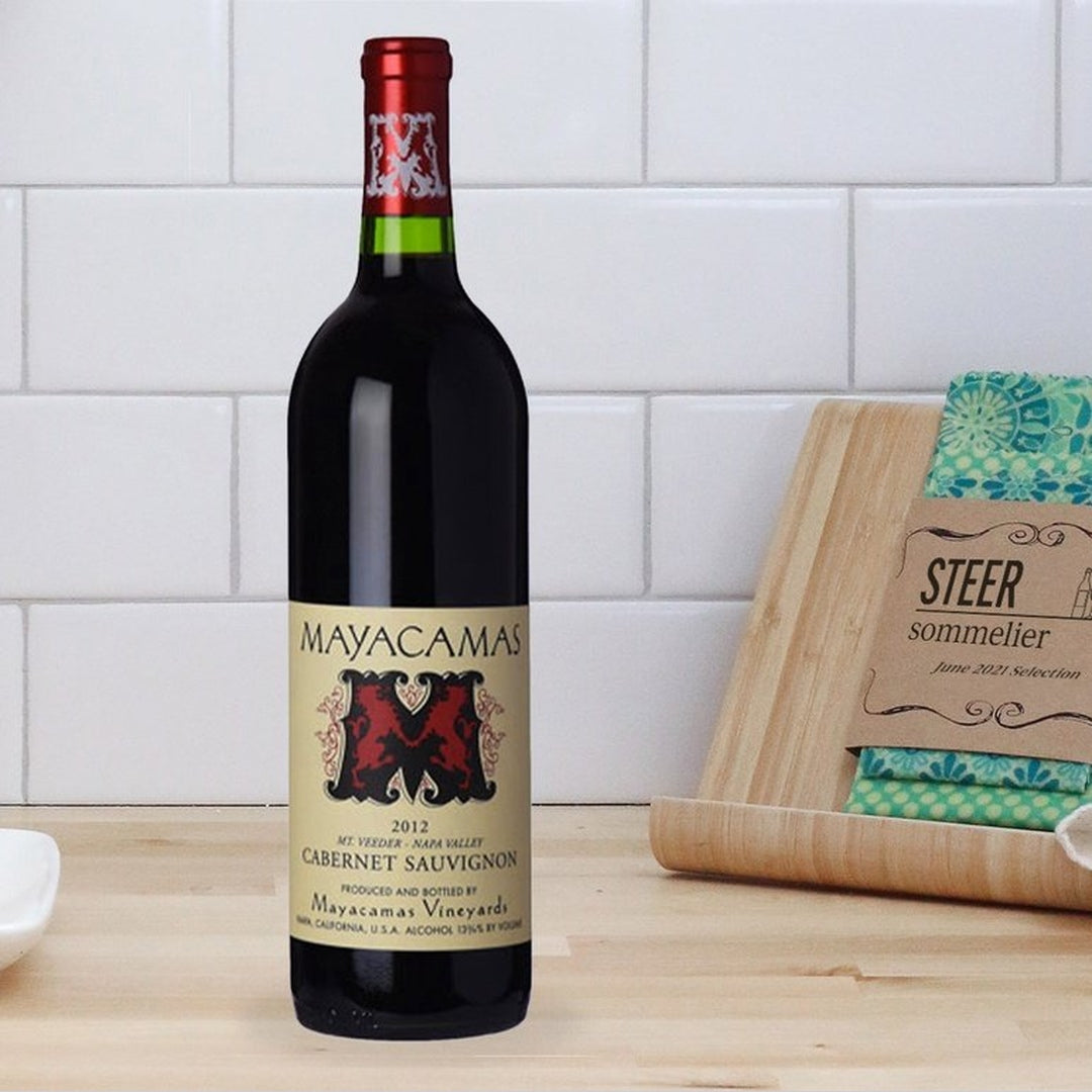 Mayacamas 2012 Mt Veeder Cabernet Sauvignon bottle on a wooden kitchen counter