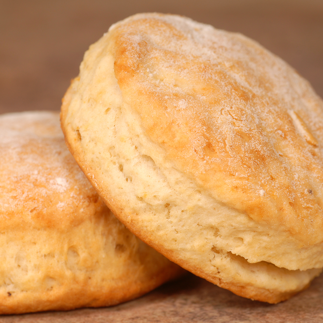 Golden flaky butter biscuits with a light dusting of flour