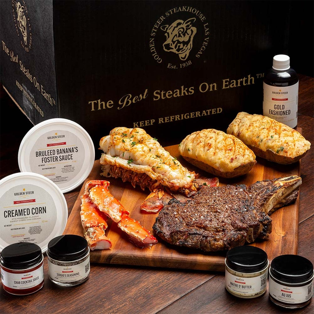 Steak and lobster surf-and-turf with twice-baked potatoes, creamed corn and Golden Steer box reading 'The Best Steaks On Earth'