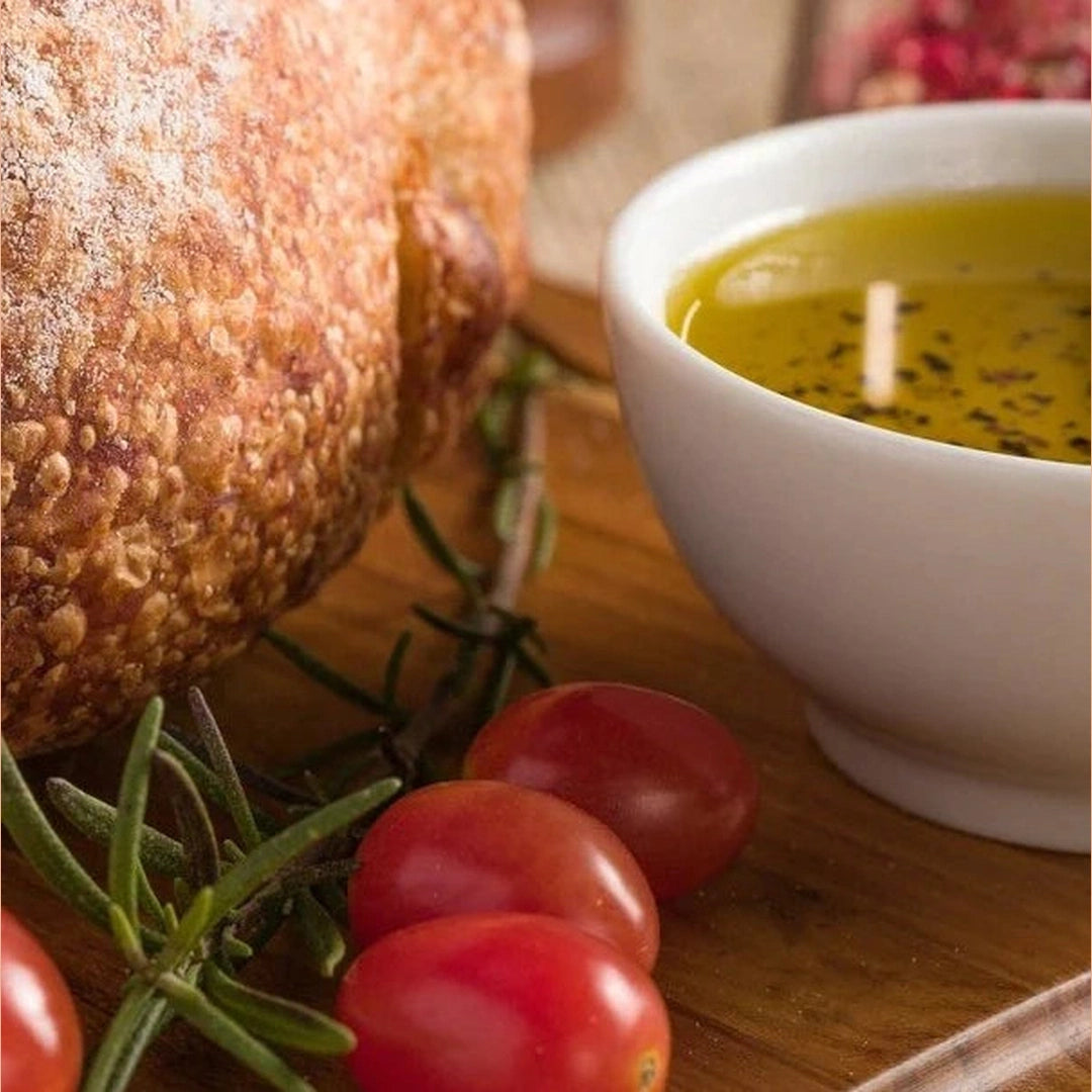 Crusty bread, cherry tomatoes, rosemary and a bowl of herbed olive oil for dipping